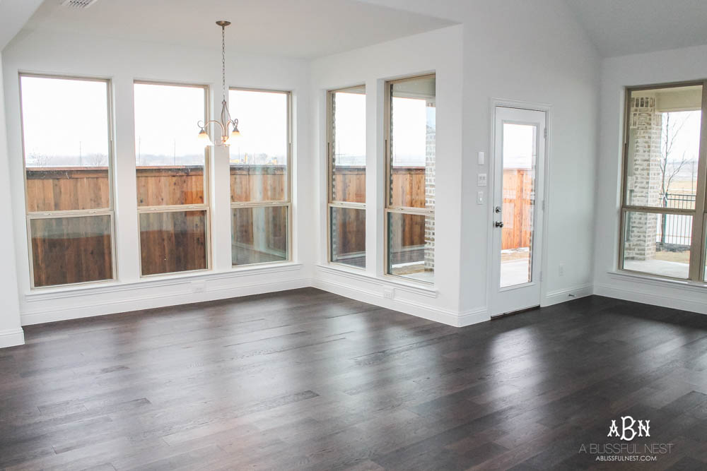 See how I transformed this builder grade breakfast room into a gorgeous coastal look with a full source list! #ABlissfulNest 