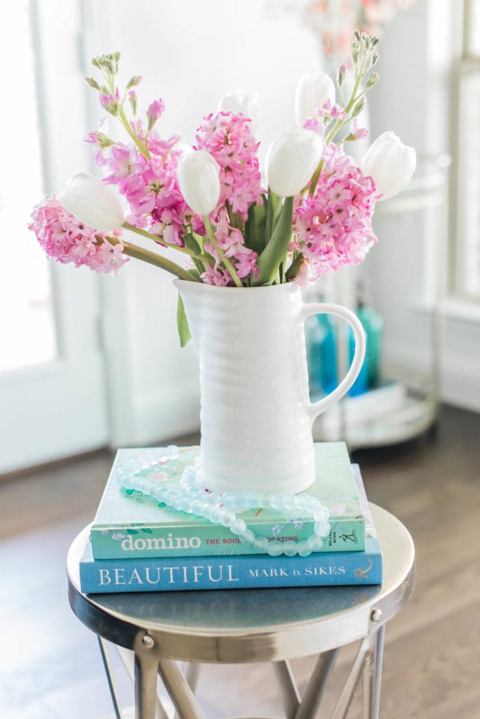 Add colorful books to your spring decor. #ABlissfulNest #springideas #springdecor