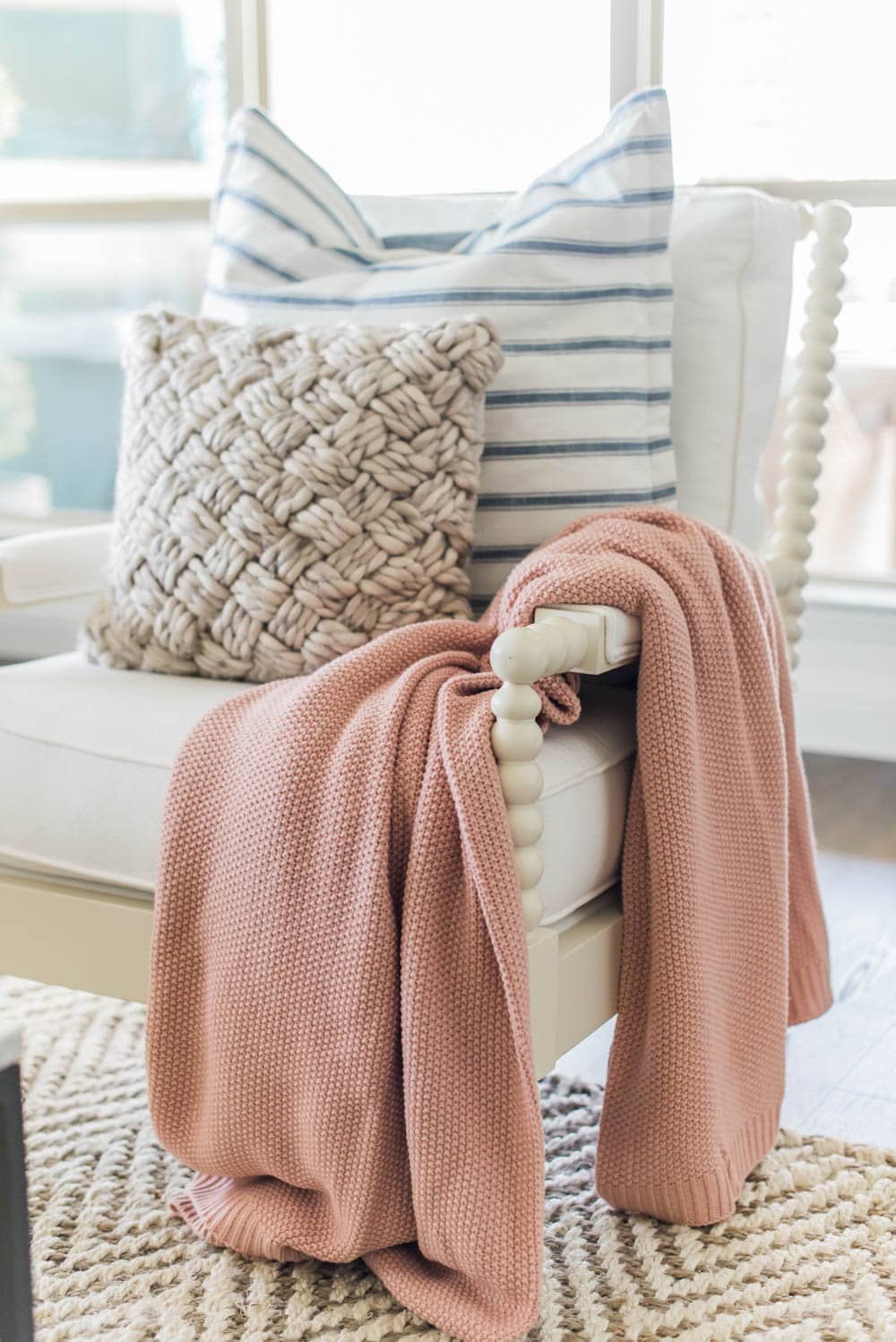 Add beautiful lightweight throw blankets to your living room for effortless spring decorating ideas. #ABlissfulNest #springideas #springdecorating 