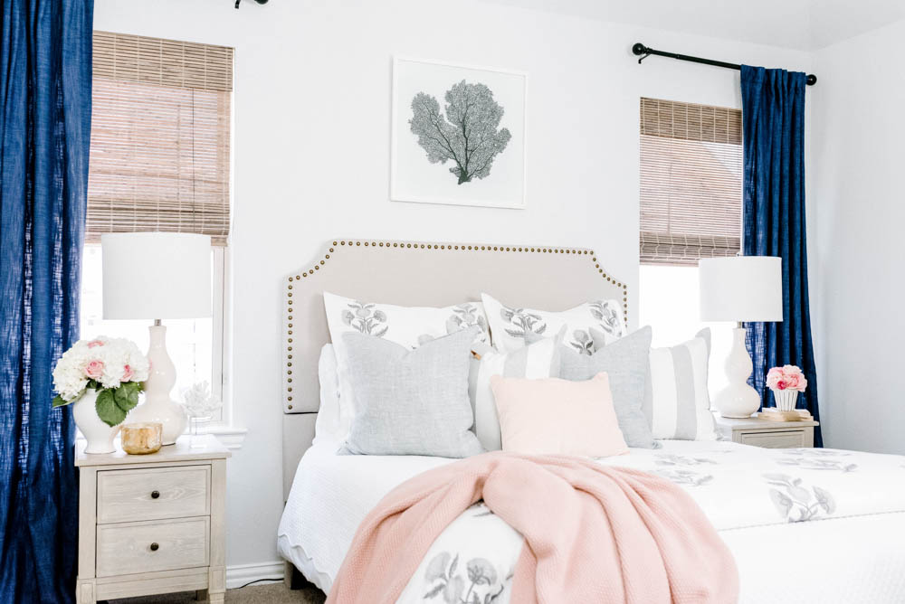 Blue and blush bedroom with navy accents. Summer decorating ideas for a bedroom or a guest bedroom. #ABlissfulNest #summer #guestbedroom #bedroomideas