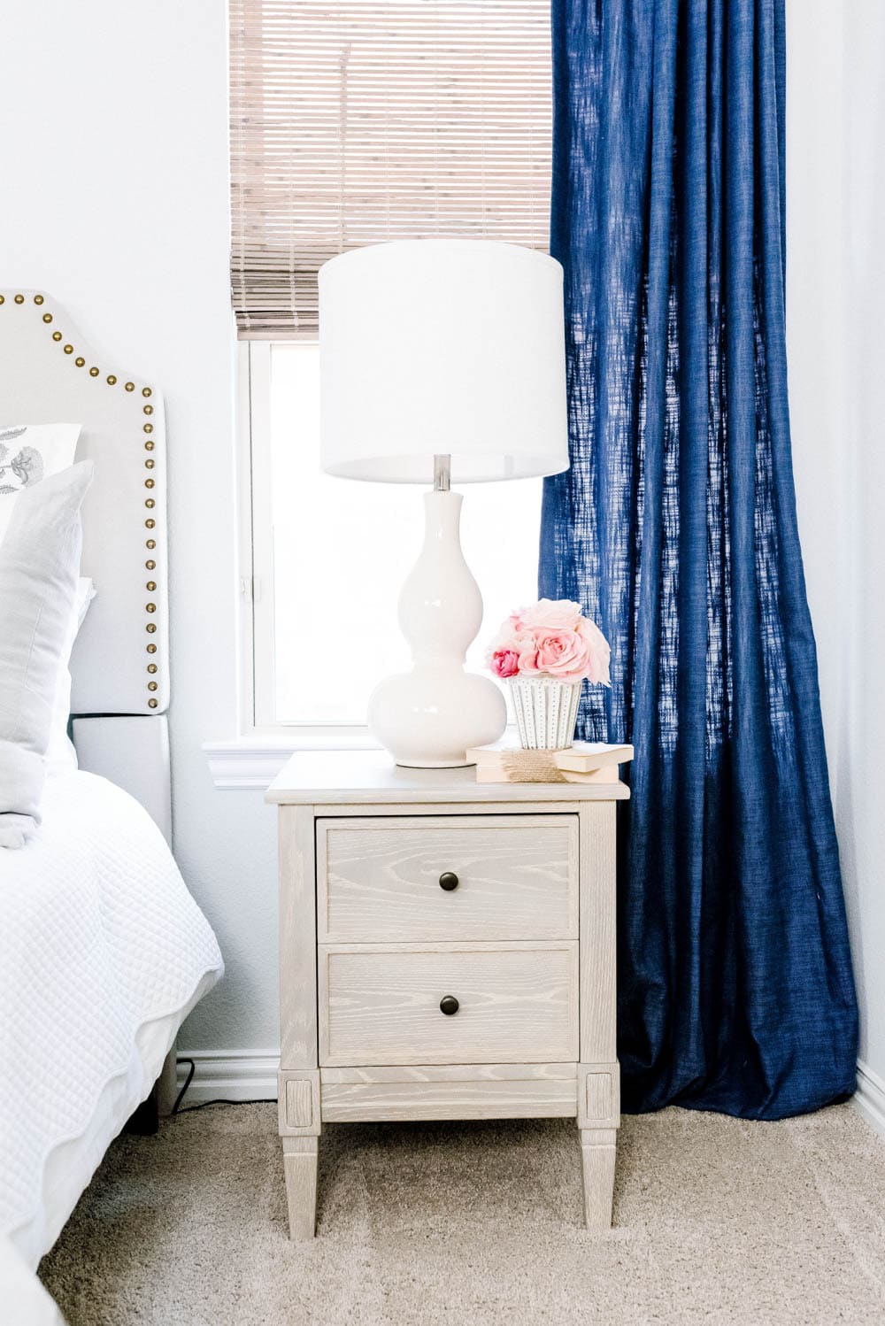 Blue and blush bedroom with navy accents. Summer decorating ideas for a bedroom or a guest bedroom. #ABlissfulNest #summer #guestbedroom #bedroomideas