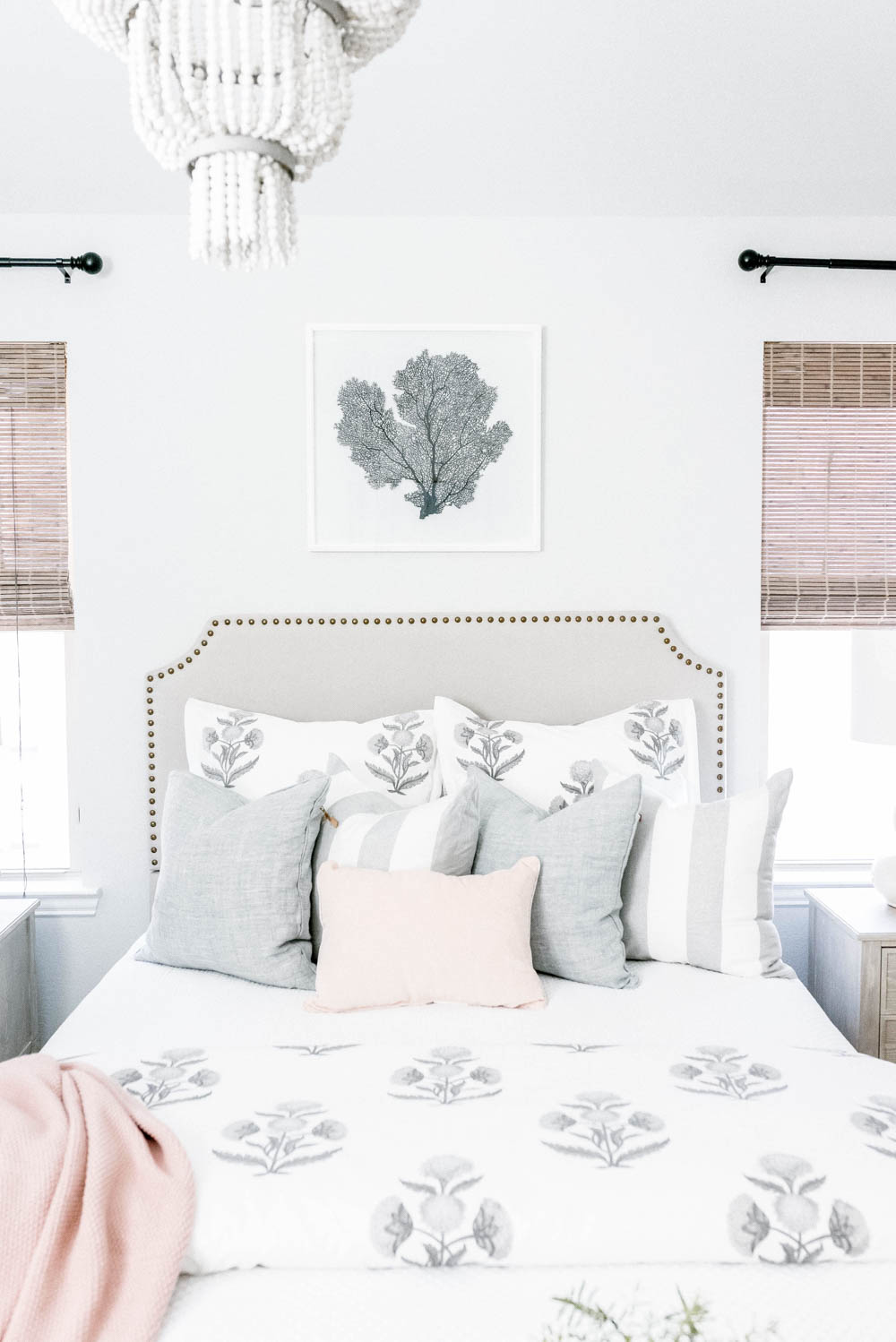 Blue and blush bedroom with navy accents. Summer decorating ideas for a bedroom or a guest bedroom. #ABlissfulNest #summer #guestbedroom #bedroomideas