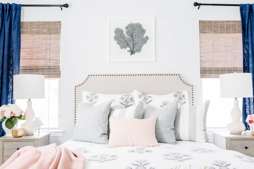 Blue and blush bedroom with navy accents. Summer decorating ideas for a bedroom or a guest bedroom. #ABlissfulNest #summer #guestbedroom #bedroomideas