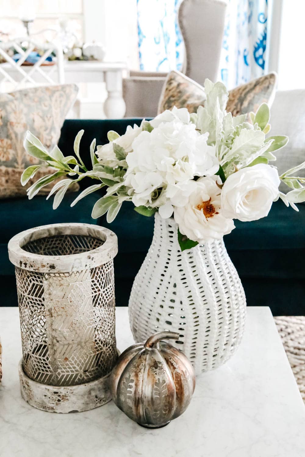 Vintage pieces mixed with more modern decor for an eclectic fall decor look for the living room. #ABlissfulNest #falldecorating #falldecor #livingroomideas 