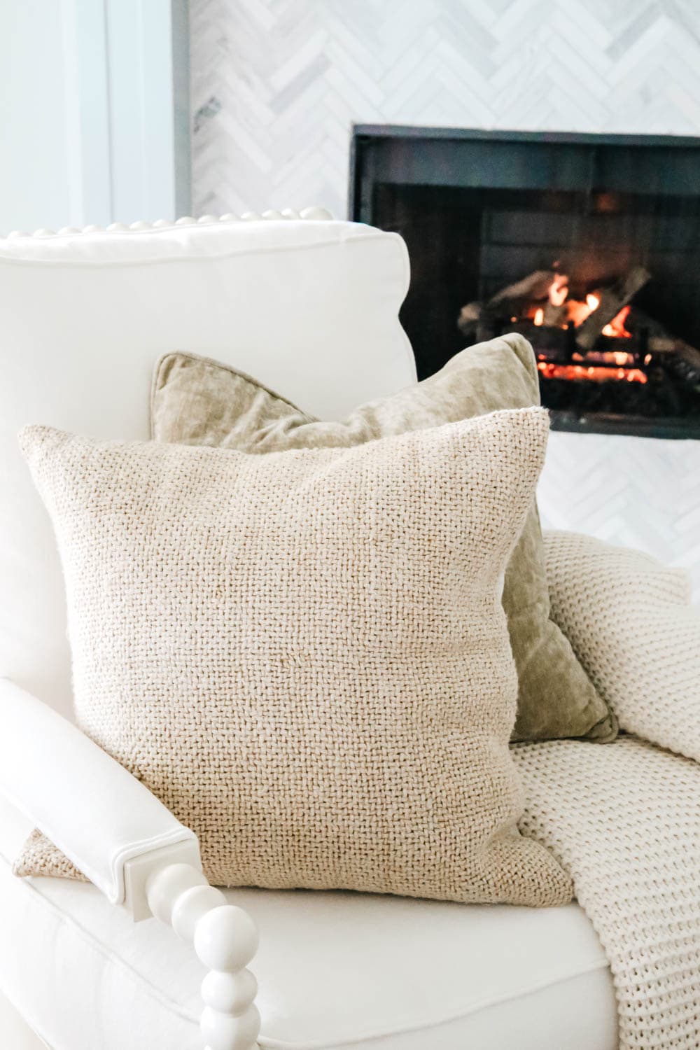 Mixing sage and tan colors for pillows in this neutral fall home tour. #ABlissfulNest #fallhometour #falldecorating 