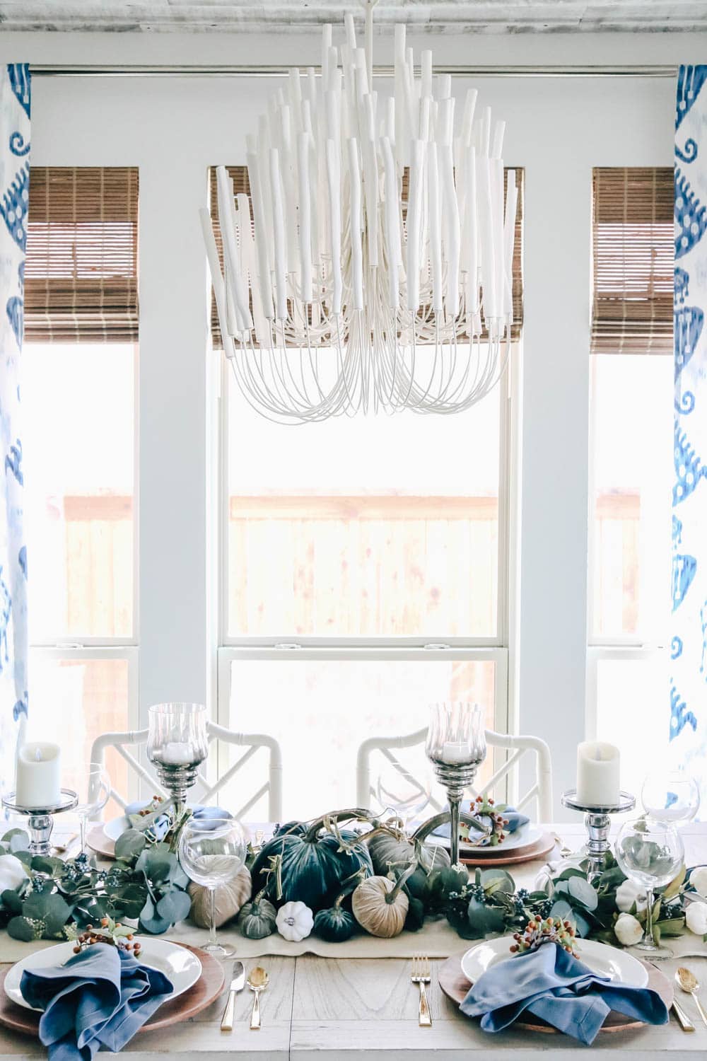 Velvet pumpkins, eucalyptus garland, wood chargers. Thanksgiving table idea. #thanksgiving #falldecor #fallinspiration