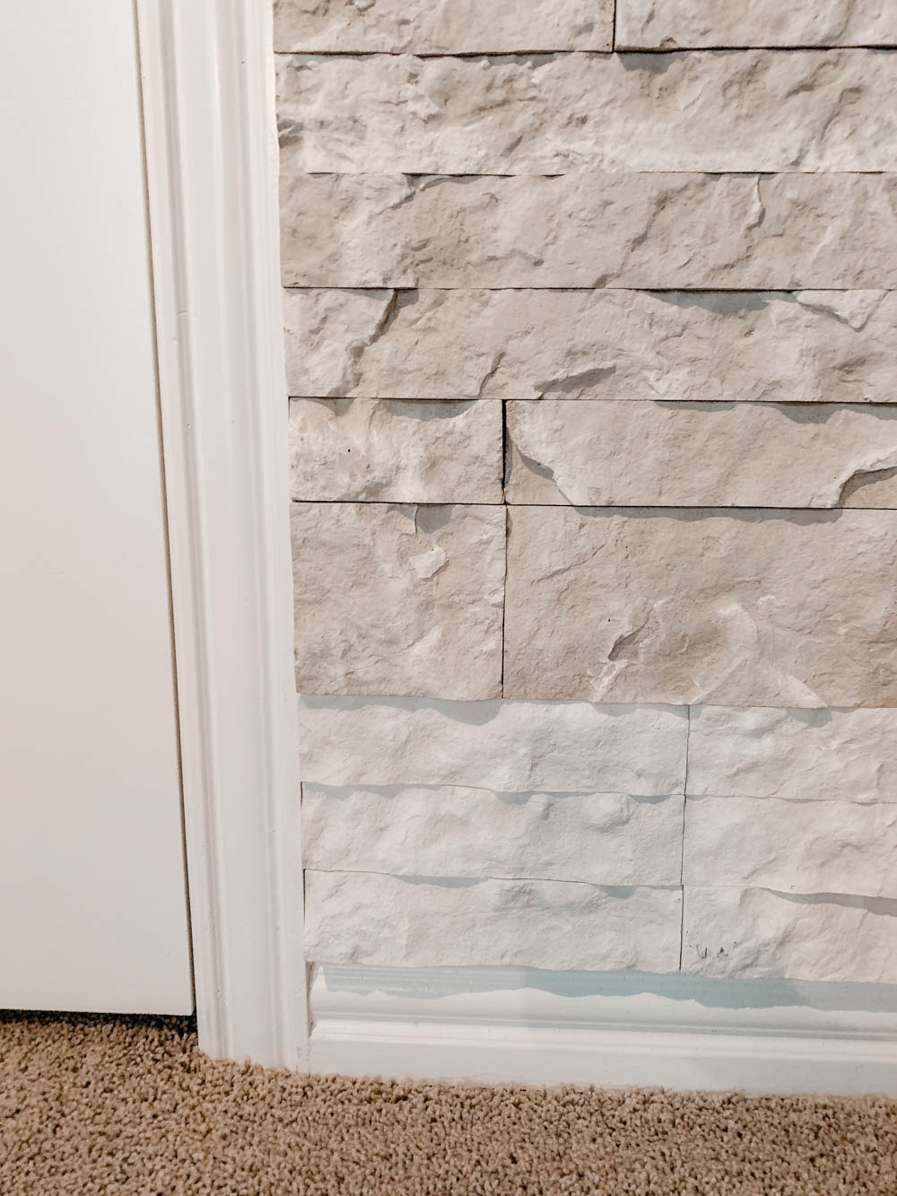 Tips and tricks on how to build a faux stone wall in your home. #ABlissfulNest #diytutorial