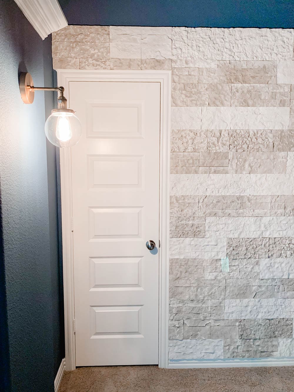 Tips and tricks on how to build a faux stone wall in your home. #ABlissfulNest #diytutorial