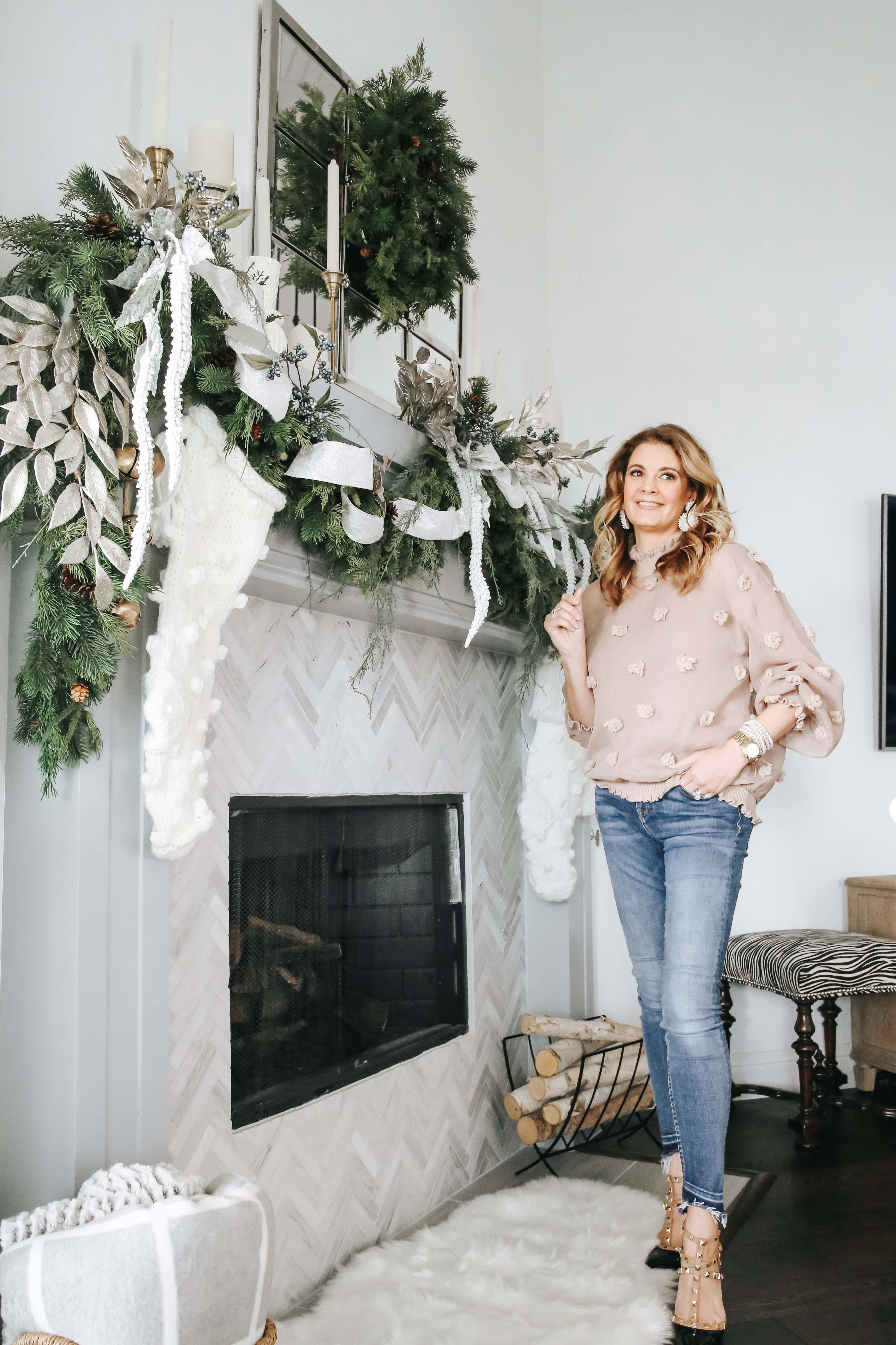Holiday mantle decorating with soft winter white accents and evergreen details. #ABlissfulNest #christmasmantle #christmasdecoratingideas