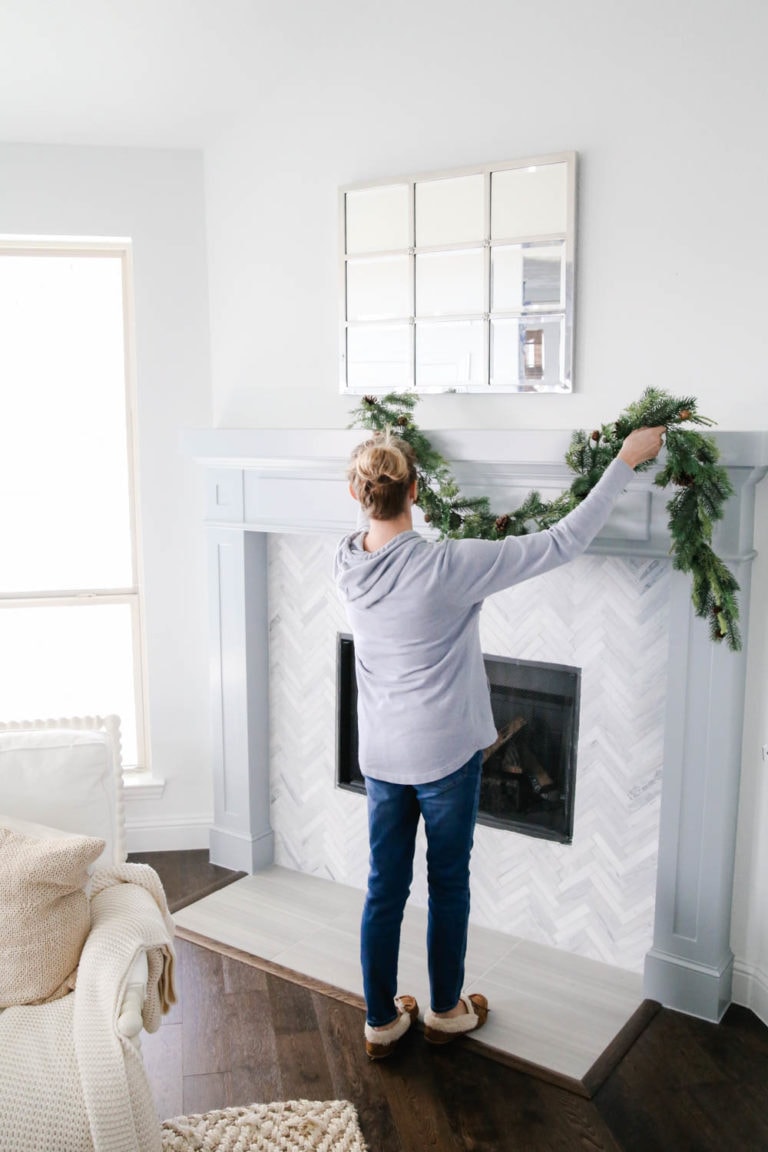 How To Hang Holiday Garland Without Damaging Your Mantel