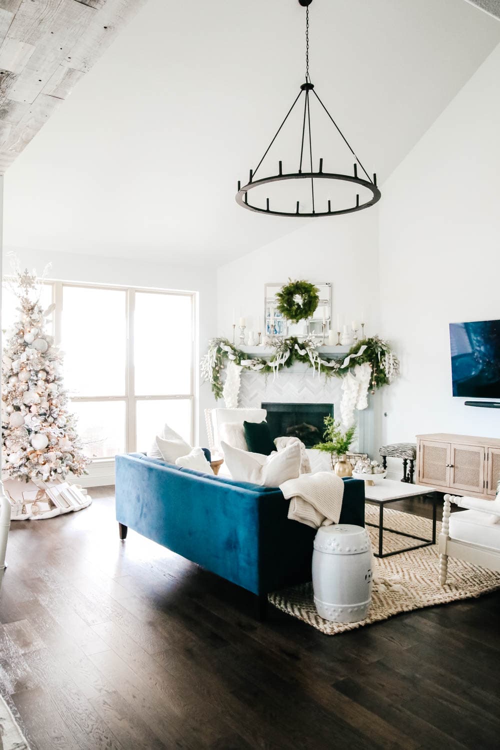 Green accent and soft subtle Christmas decor in a blue and white living room. #ABlissfulNest #christmasdecor #christmashometour