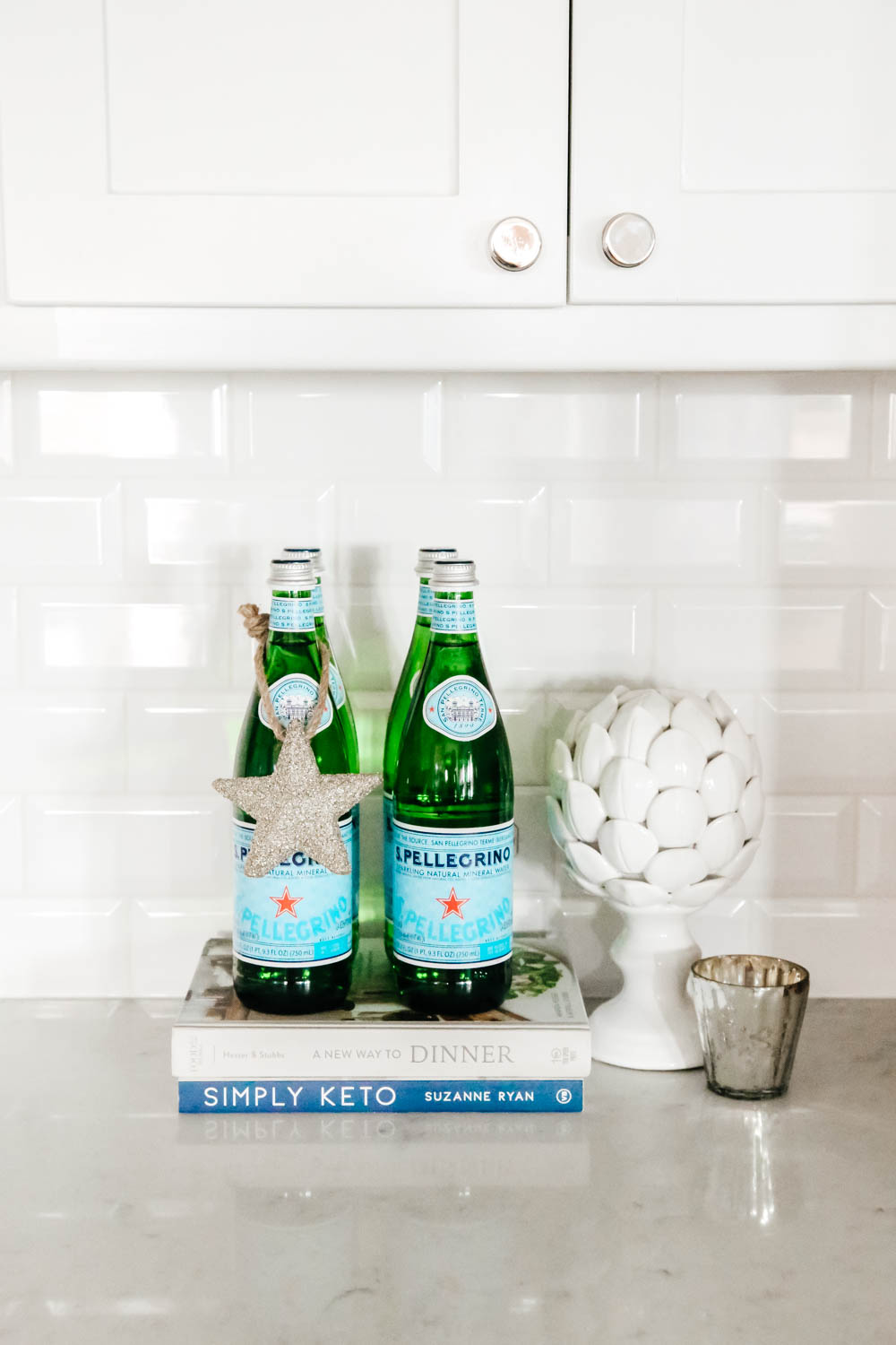 Subtle Christmas decor in a white kitchen. #ABlissfulNest #whitekitchen #Christmasdecor