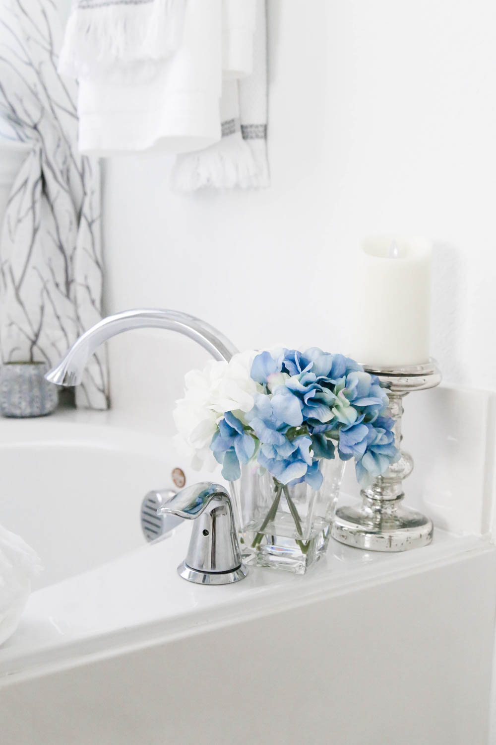 Create ambience with flowers and candles. #AtHomeStores #AtHomeFinds #ABlissfulNest #ad