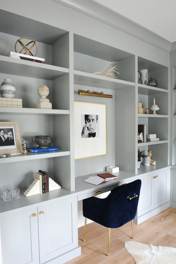 This gorgeous grey blue color is a serene color pallet for a home office. #homeofficeideas #homeoffice #office