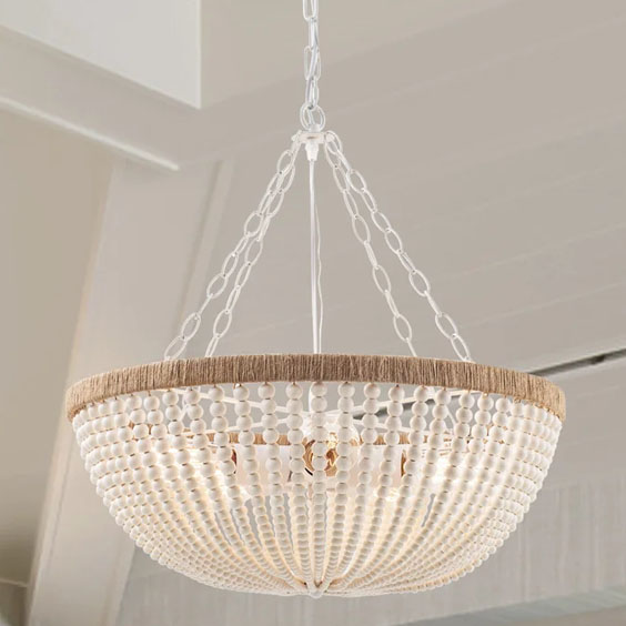 This wooden beaded chandelier is so chic and beautiful for a bedroom in your home! #ABlissfulNest