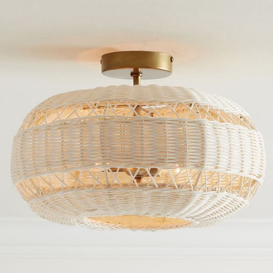 This woven rattan flush mount is a stunning statement piece to add to your home! #ABlissfulNest