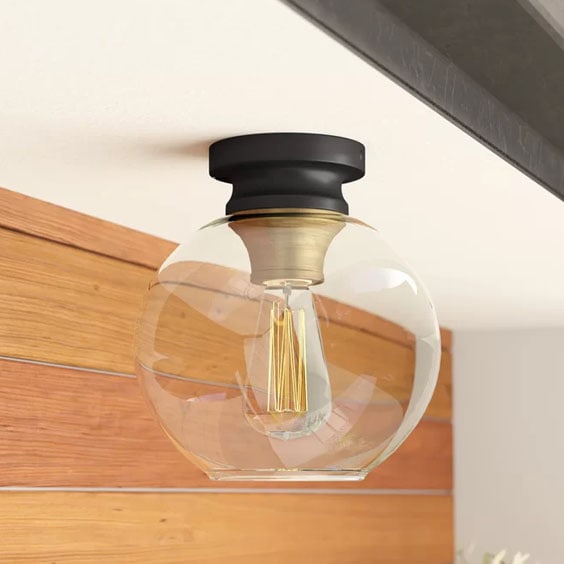 This glass globe flush mount is under $80! #ABlissfulNest