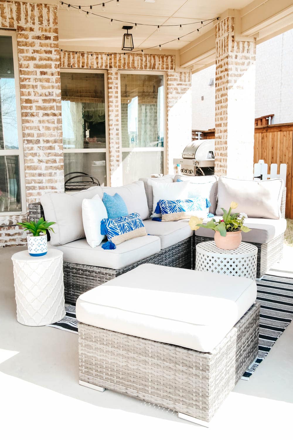 Comfortable seating, throw pillows in beautiful blue. #ABlissfulNest #patio #outdoor #backyard