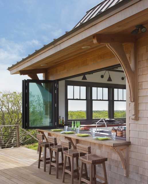 sliding windows create an outdoor bar area