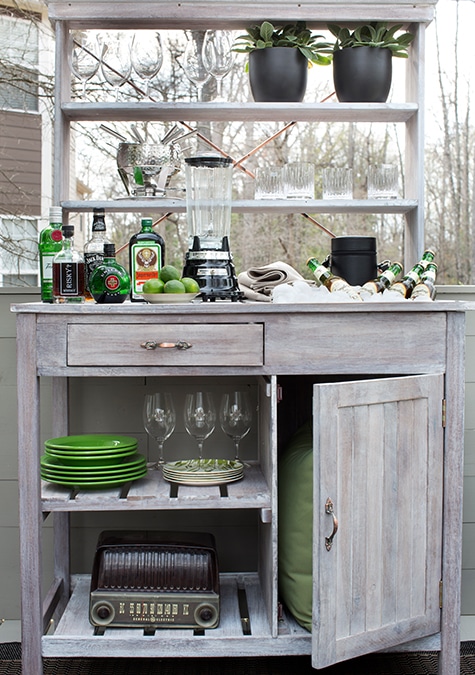 a potting bench turned into an outdoor bar