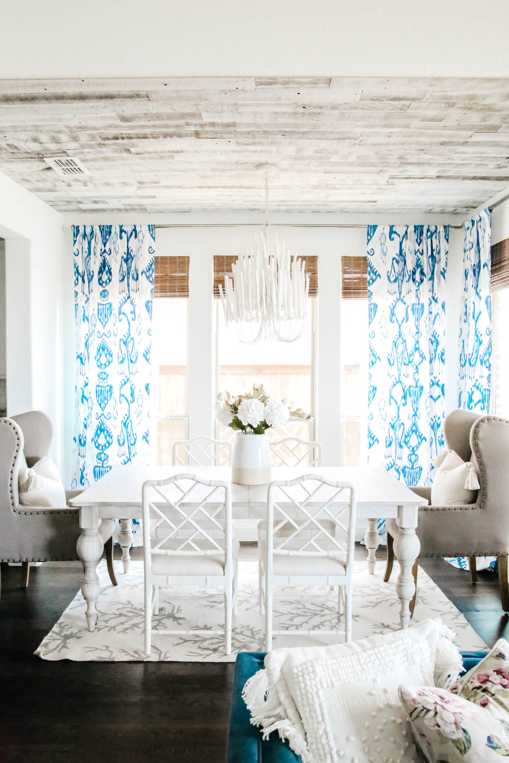 Blue and white dining room with bamboo shades. #diningroom #breakfastroom #ABlissfulNest