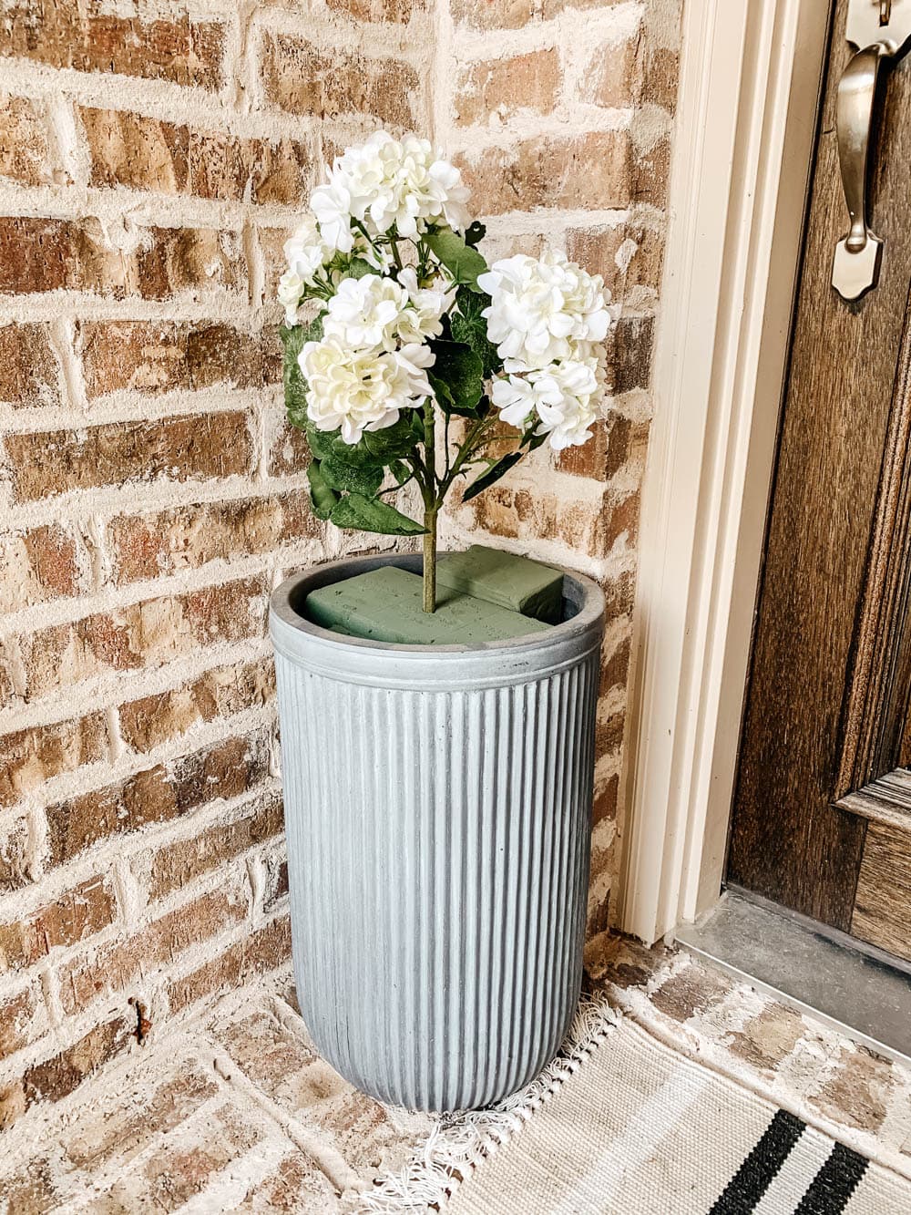 How to Fill an Outdoor Planter with Artificial Flowers?