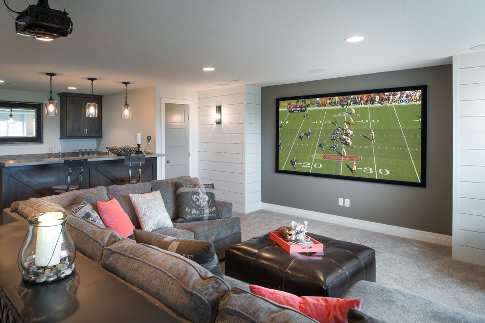 Amazing home theater with a sports theme. #hometheater #mediaroom #theater