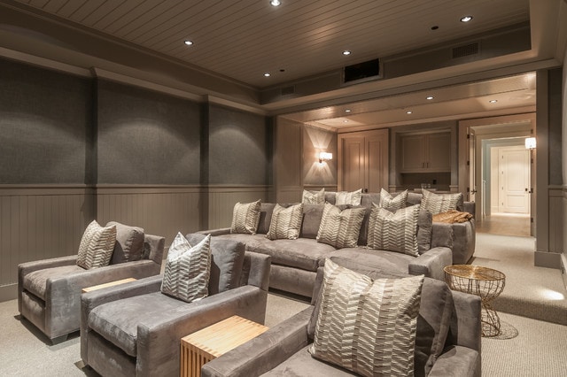 Love this stadium seating set up in this media theater room. #theaterroom #mediaroom