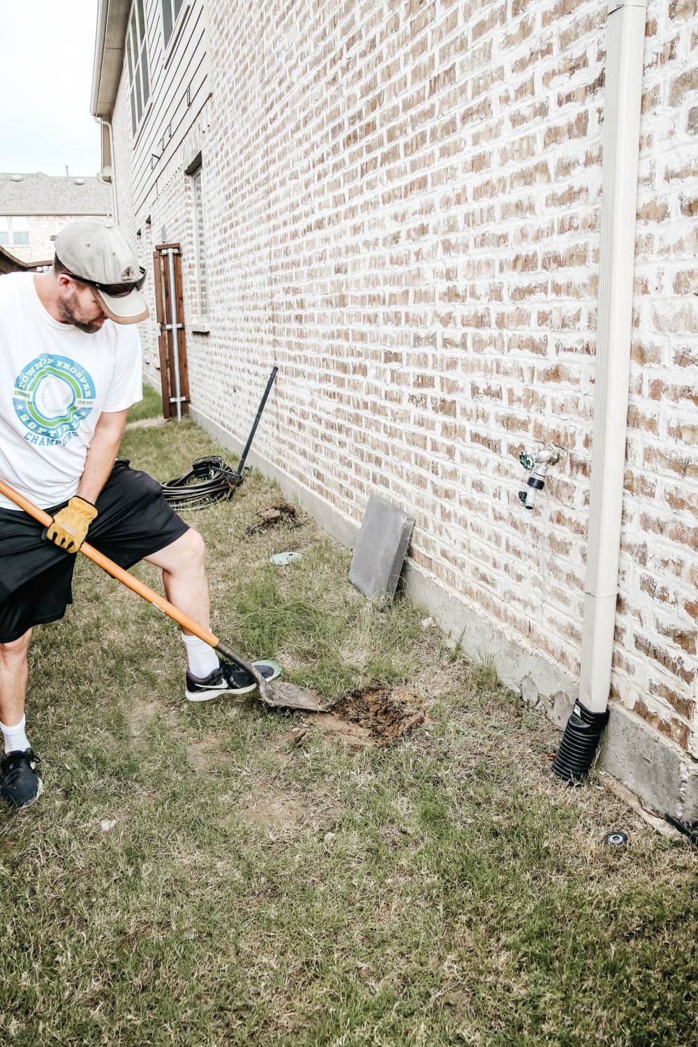 Install a rain barrel system for your home and save money and conserve your water supply. Simple step-by-step tutorial for installing a rain barrel. #ABlissfulNest