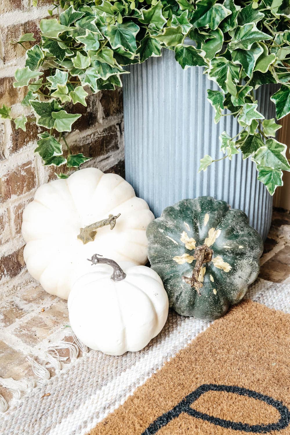 Cluster pumpkins on your porch. #ABlissfulNest #falldecor #fallporch