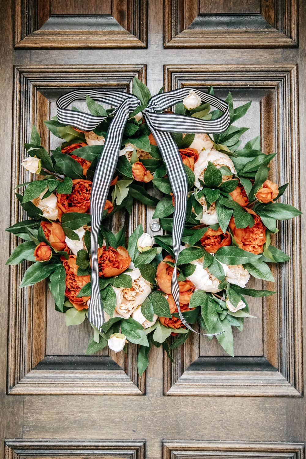 Choose a fall wreath with vibrant colors of the season. #ABlissfulNest #fallporch