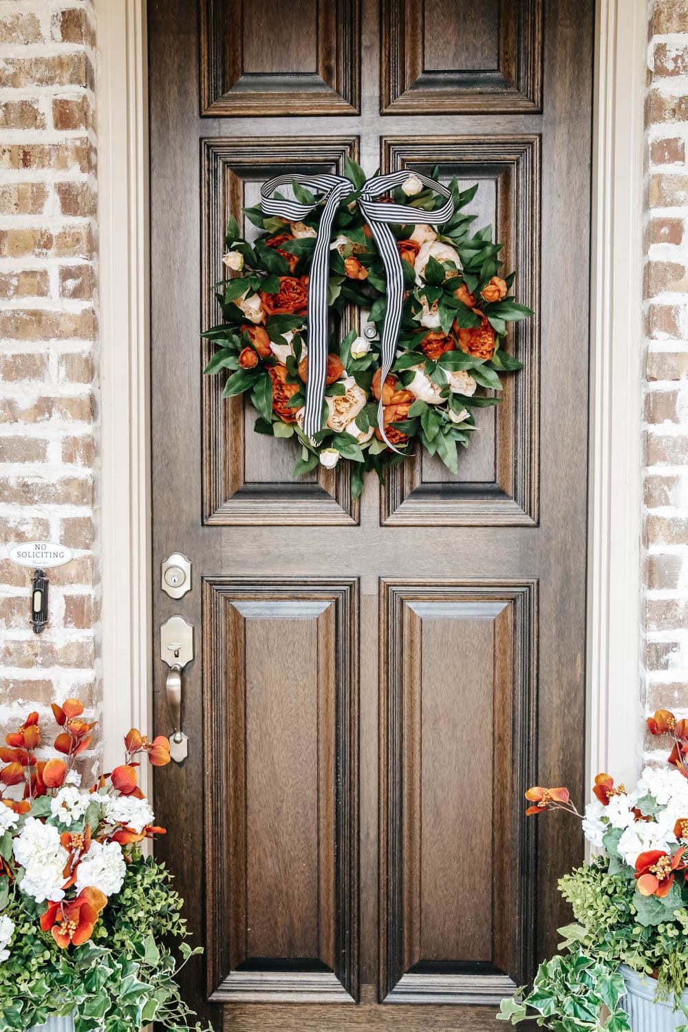 Choose a fall wreath with vibrant colors of the season. #ABlissfulNest #fallporch