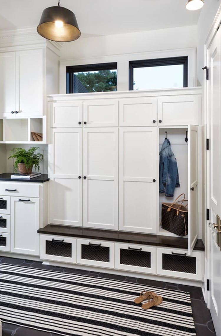 This stunning modern transitional mud room by David Charlez Designs is such a great way to make use of every space in your home!