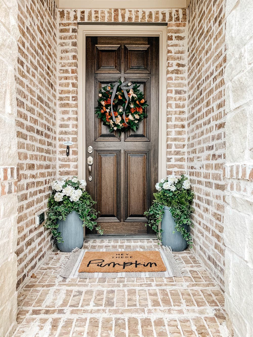 Use a fun welcoming doormat for the season. #ABlissfulNest #falldecor #fallporch