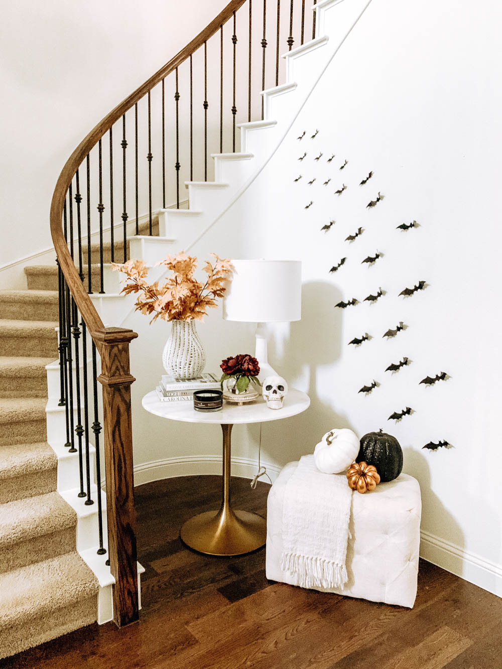 Entryway halloween decor ideas with flying bats and skeletons. #ABlissfulNest #halloweenideas #halloweendecor