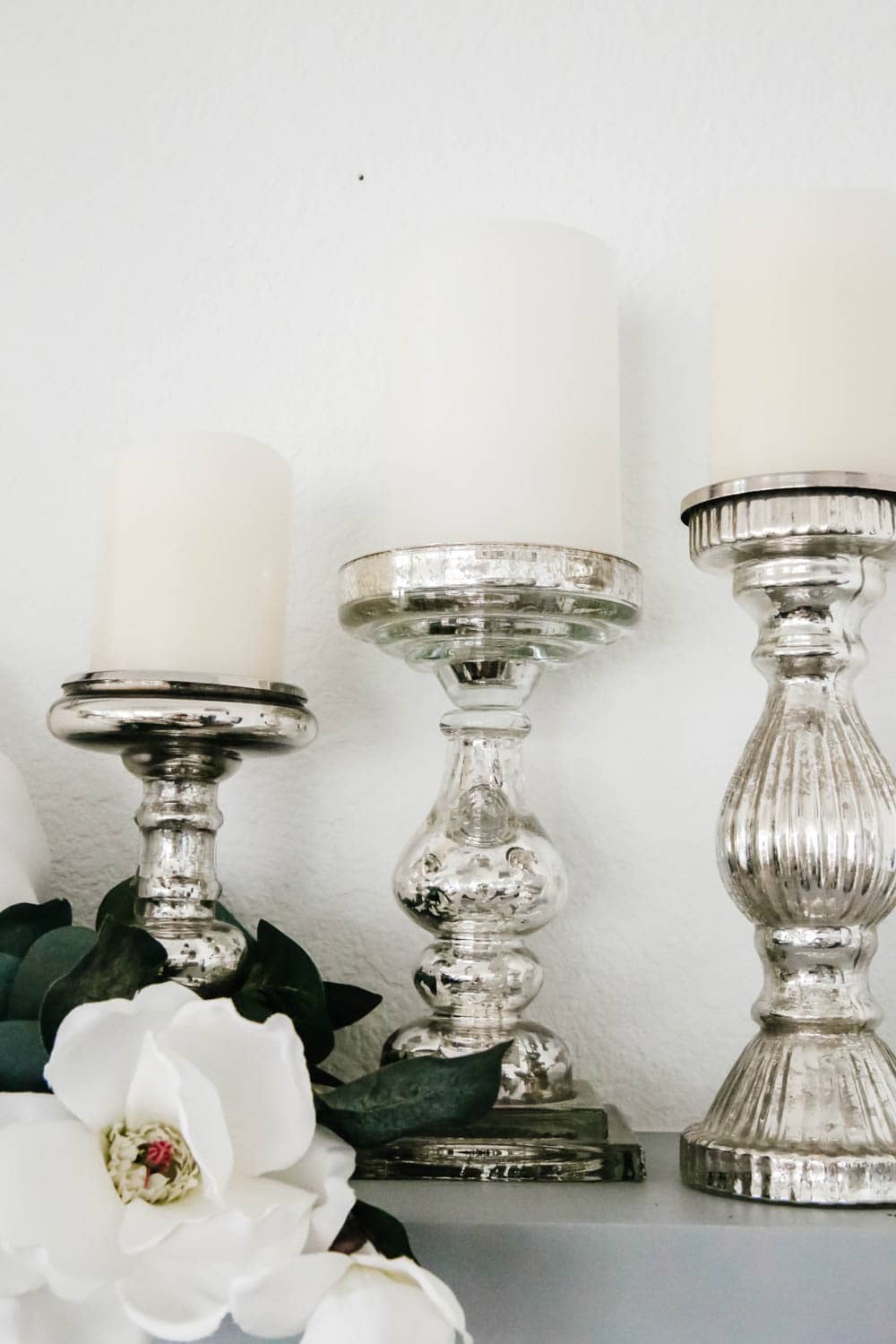 Cluster mercury glass candle holders for a cozy fall vibe. #ABlissfulNest #falldecorideas