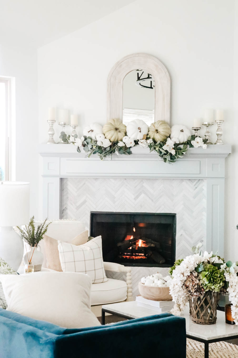Blue mixed with green and white accents for this fall mantle. #ABlissfulNest #falldecor #livingroom
