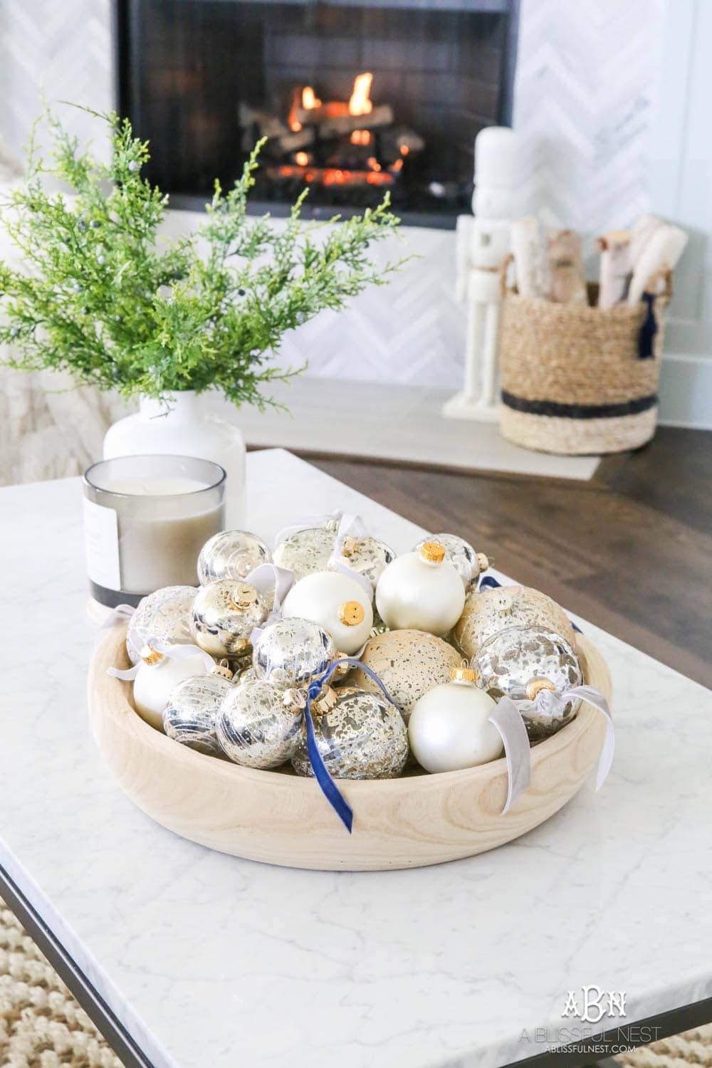 Group ornaments in a bowl tied with velvet ribbons. #ABlissfulNest #christmasdecor #christmasideas