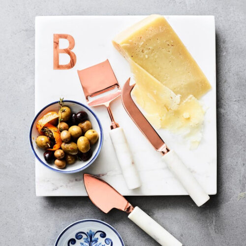 This marble and copper monogrammed cheese board is such a great gift idea! #ABlissfulNest