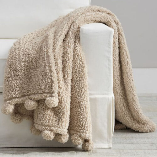This sherpa throw blanket is such a fun and cozy piece to add to your living room and to gift this holiday season! #ABlissfulNest