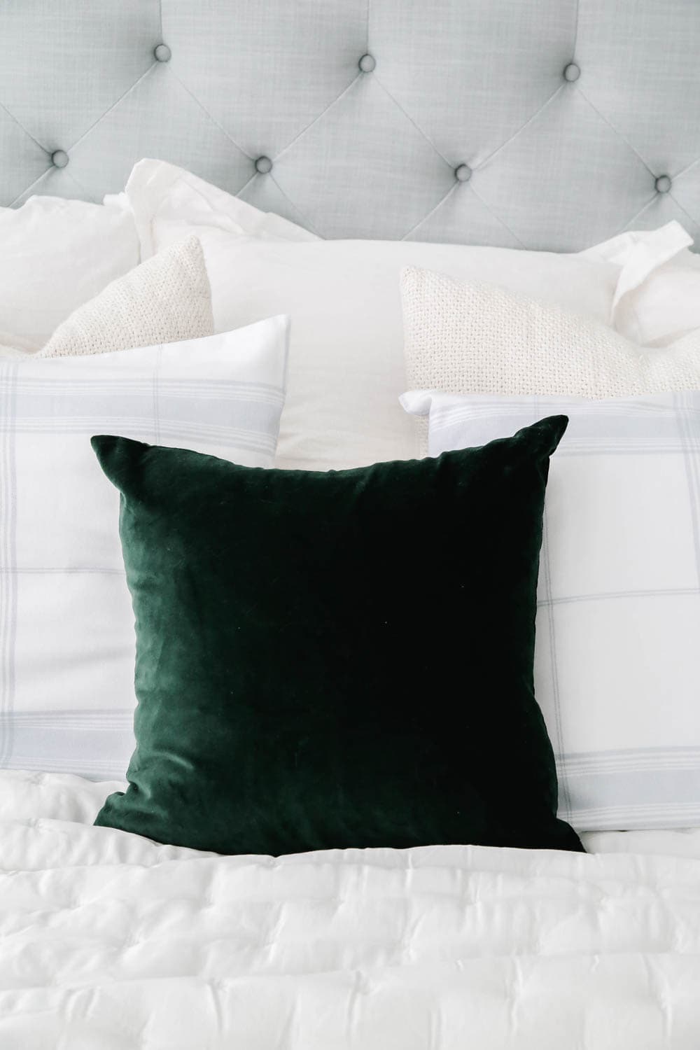 Add touches of green to your bedroom for the holiday season. #ABlissfulNest #bedroom #bedroomdecor