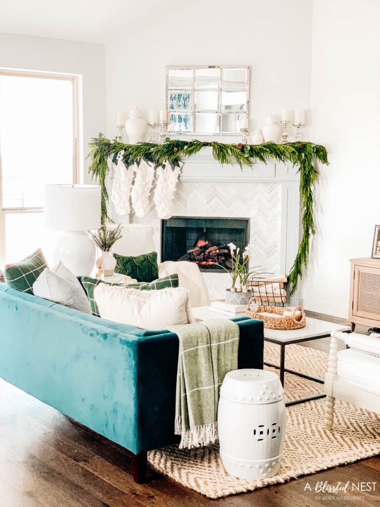 Crisp winter greenery, knit stockings, simple neutral Christmas decor ideas. #ABlissfulNest #christmas #christmasdecor #christmasideas