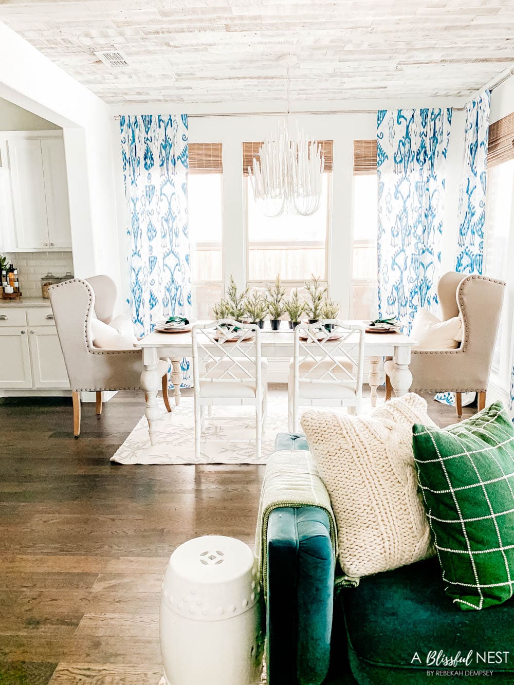 Blue and white dining room with Christmas decor. #ABlissfulNest #christmasdecor #diningroom