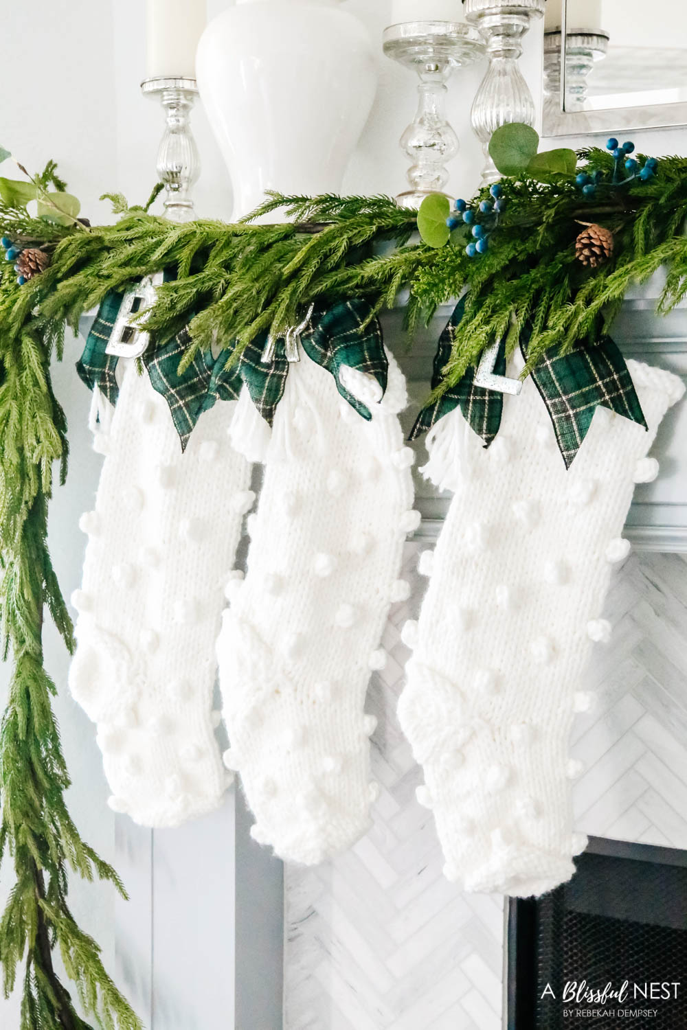Knit stockings, Christmas garland, Christmas mantle, Christmas decorating. #ABlissfulNest #christmasdecor #christmasideas