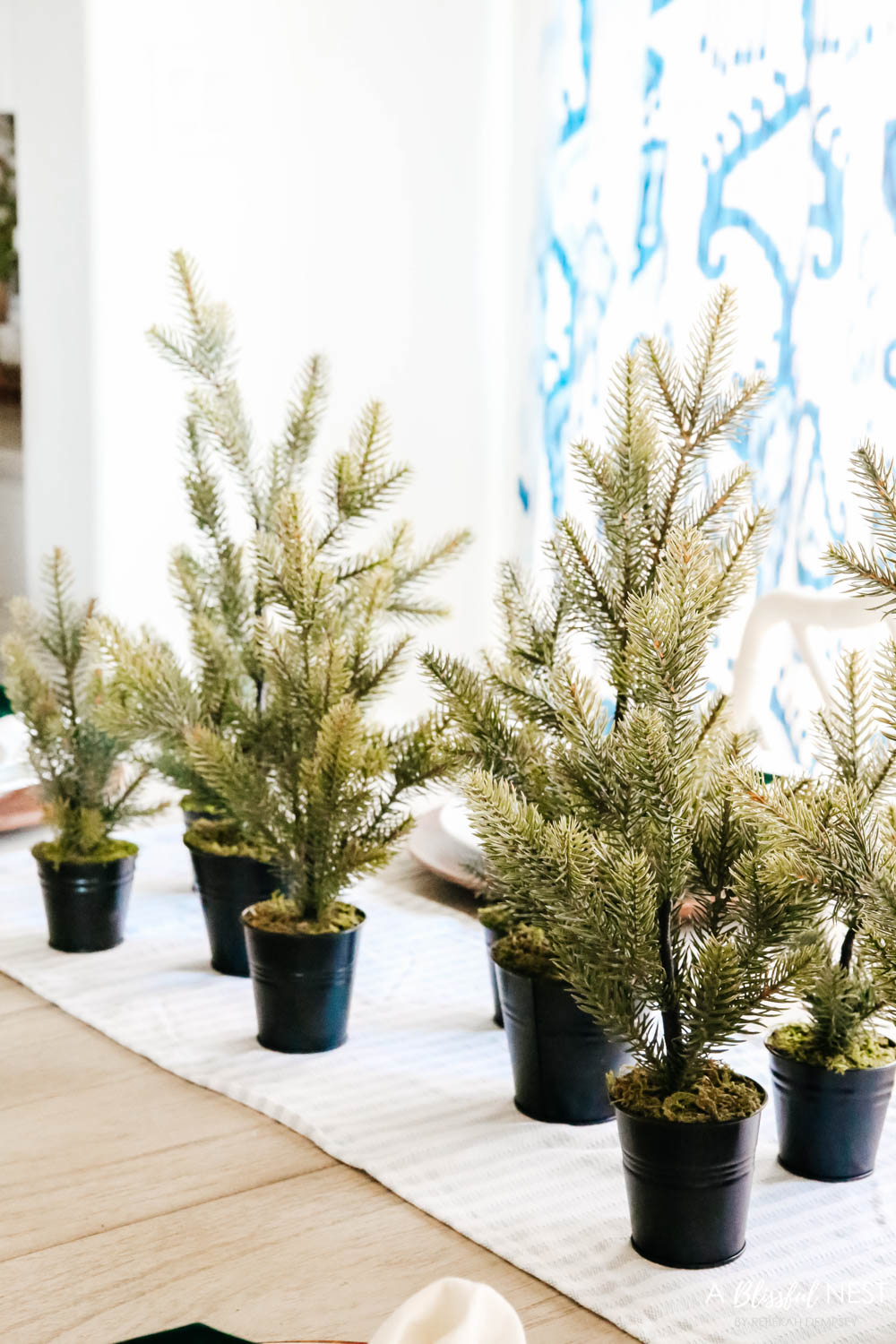 Blue and white dining room with Christmas decor. #ABlissfulNest #christmasdecor #diningroom