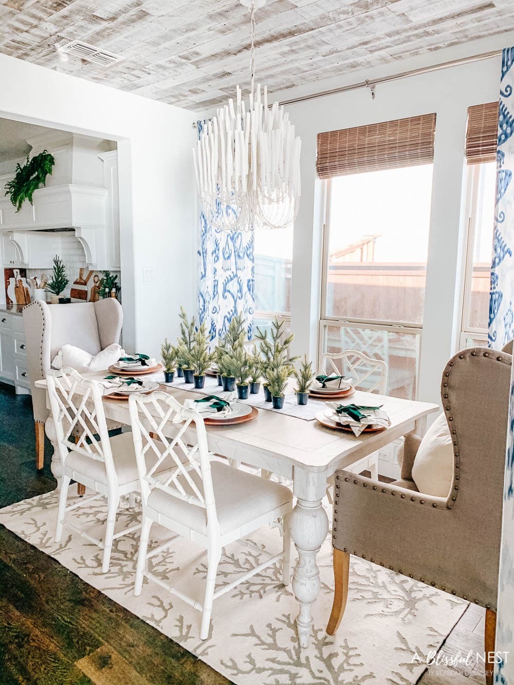 Blue and white dining room with Christmas decor. #ABlissfulNest #christmasdecor #diningroom