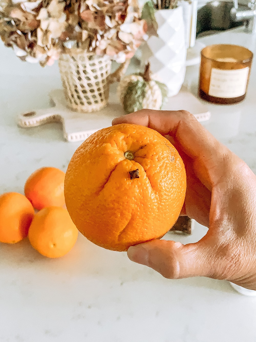 Such an easy and delicious smelling orange clove pomander to add to your fall tables and to decorate with. #ABlissfulNest #fall #appetizer