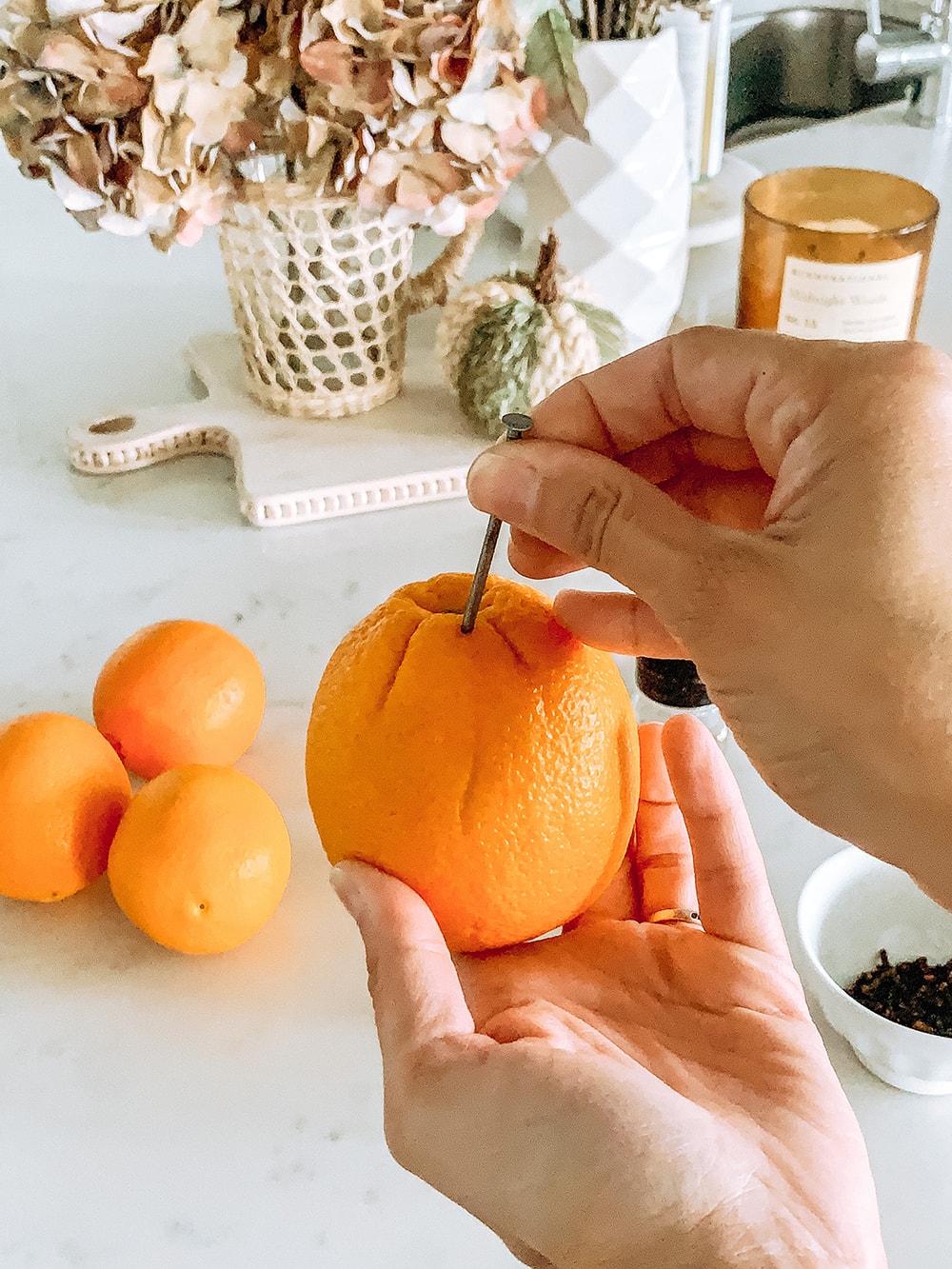 Such an easy and delicious smelling orange clove pomander to add to your fall tables and to decorate with. #ABlissfulNest #fall #appetizer
