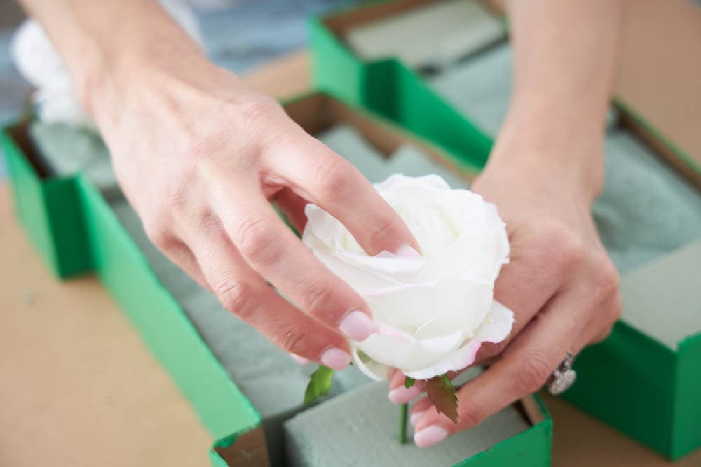 Use a paper mache letter, floral foam, and fake flowers to make a personal  floral initial to brighten up any room. Simp…