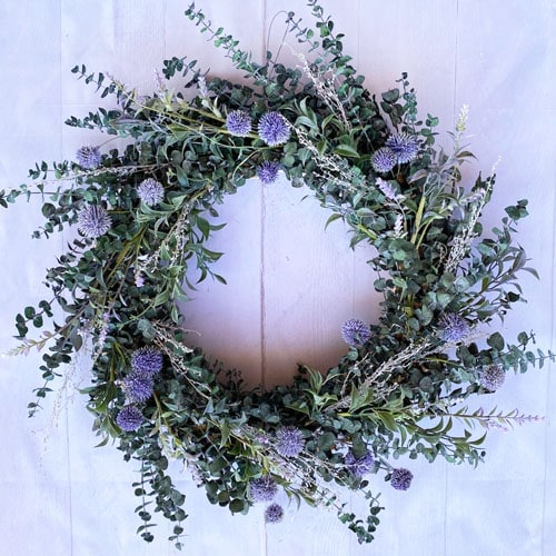 This eucalyptus and globe thistle wreath is a beautiful front door wreath for spring! #ABlissfulNest